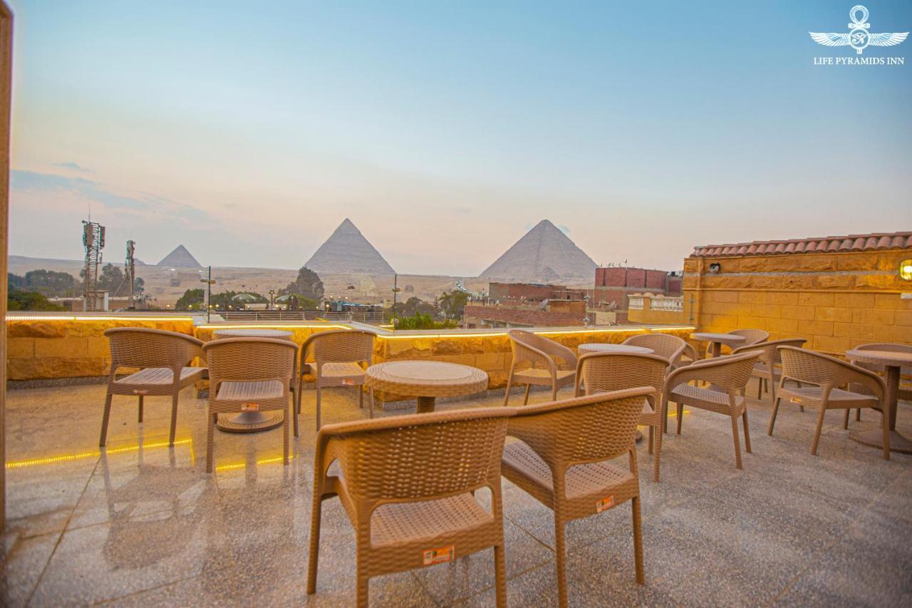 Life Pyramids Inn Kairo Bagian luar foto